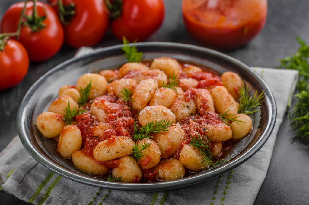 Gnocchi tomato sauce herbs, fresh parmesan cheese top, delish food